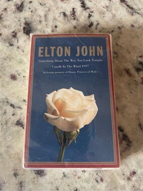 Elton John -  "Candle in the Wind 1997" and "Something About the Way You Look To